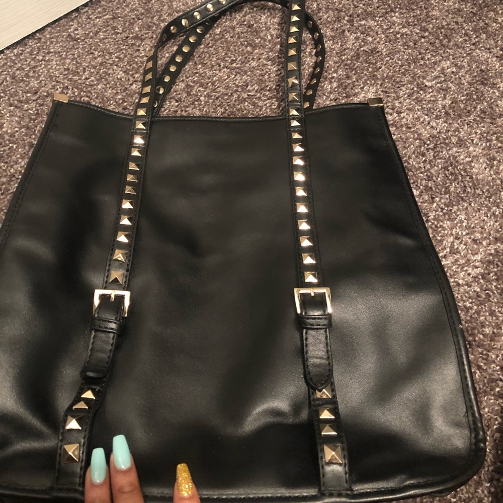 Large black studded shoulder bag